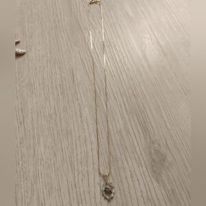 Delicate Gold Necklace with Gemstone Pendant